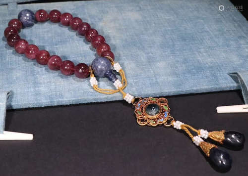 A TOURMALINE STRING BRACELET