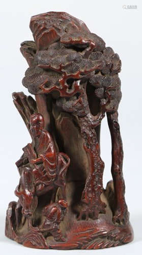 A BAMBOO CARVED FIGURE SHAPED PENDANT