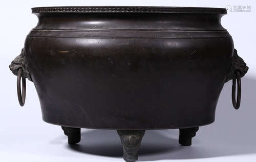 A COPPER CASTED TRIPOD CENSER