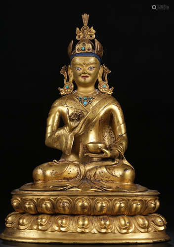 A GILT BRONZE CASTED PADMASAMBHAVA STATUE