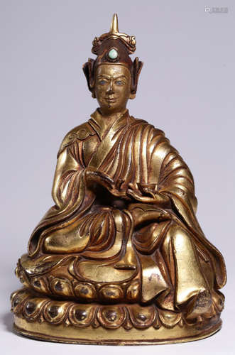 A BILT BRONZE CAST LOTUS BORN BUDDHA STATUE