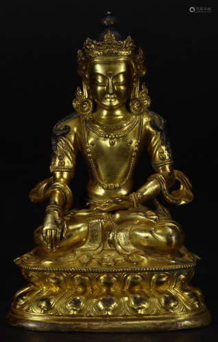 A BILT BRONZE CAST CROWNED GUANYIN BUDDHA STATUE