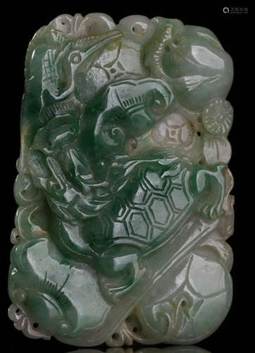 A JADEITE CARVED TABLET