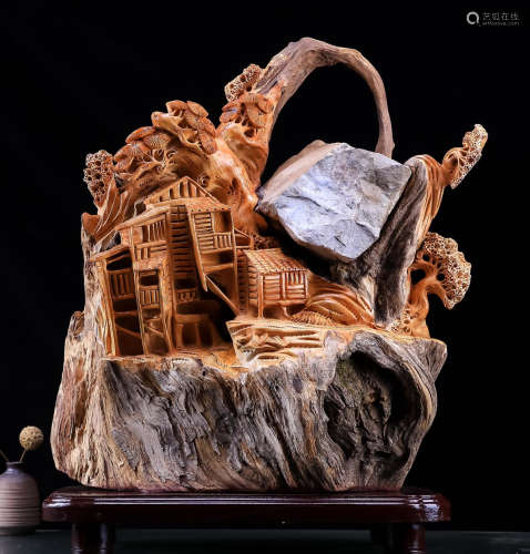 A YABAI WOOD ORNAMENT CARVED WITH LANDSCAPE