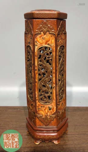A BROWN GLAZE INCENSE HOLDER CARVED WITH DRAGON