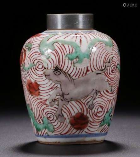 A THREE COLOR GLAZE JAR PAINTED WITH BEAST PATTERN