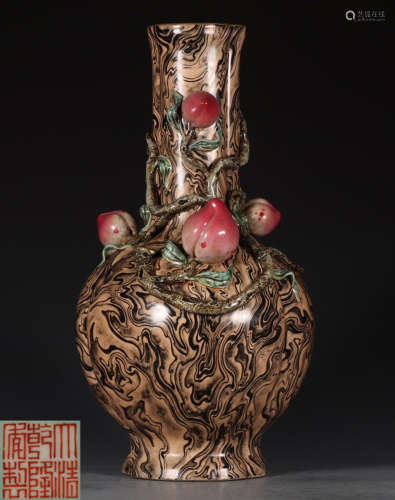 A BROWN GLAZE VASE DECORATED WITH PEACH