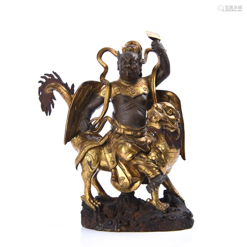 A GILT-BRONZE FIGURE OF GUARDIAN.QING PERIOD