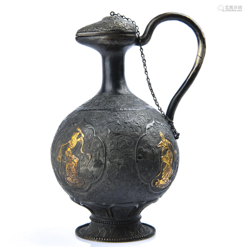 A GOLD-INLAID SILVER EWER.LIAO PERIOD