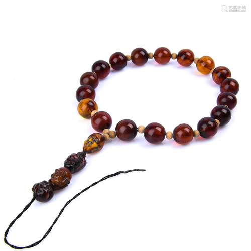 AN AMBER BRACELET