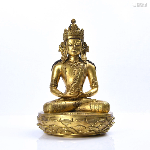 A GILT-BRONZE FIGURE OF BUDDHA.QING PERIOD