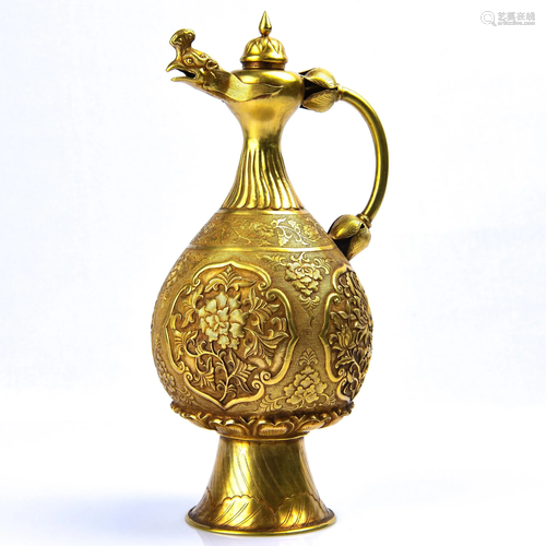 A CARVED GILT-BRONZE WINEPOT