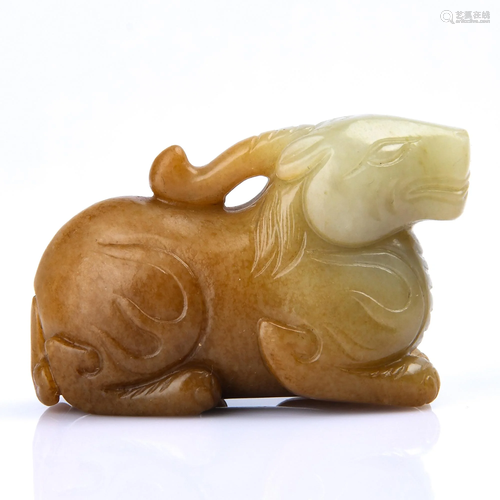 A CARVED JADE GOAT