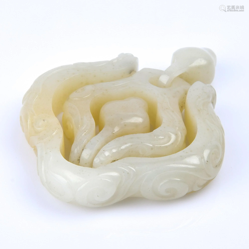 A CARVED WHITE JADE PENDANT