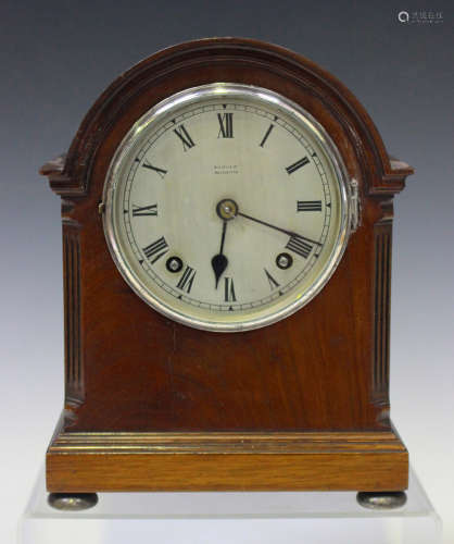 An early 20th century mahogany cased mantel clock, the eight day movement with platform