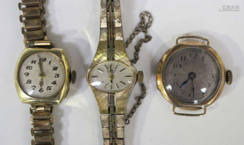 A 9ct gold cushion cased lady's wristwatch, the jewelled lever movement detailed 'Bravingtons',