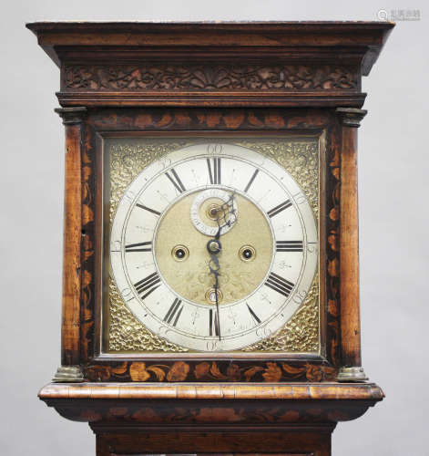 An early 18th century marquetry inlaid walnut longcase clock, the eight day movement striking the