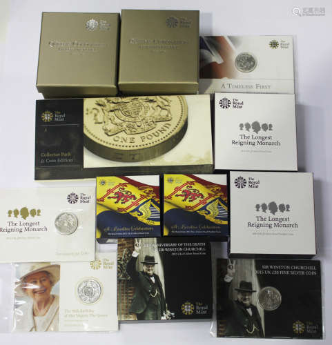 A collection of Royal Mint commemorative coins, including two Queen's Coronation 60th Anniversary