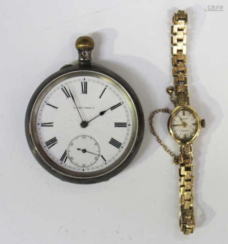 An Accurist 9ct gold lady's bracelet wristwatch, the signed oval dial with baton hour markers, the