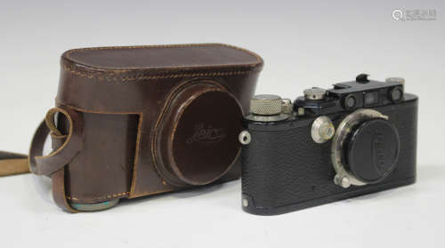 A Leica III camera, serial No. 145805, circa 1934, with Elmar 1:3,5 F=50mm lens, leather cased,