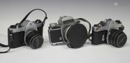A Pentax SP500 camera with Super-Takumar 1:2/55 lens, a Pentax Spotmatic F with SMC Takumar 1:1.4/50
