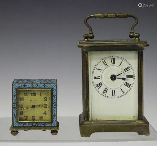 An Art Deco turquoise enamelled brass bedside alarm clock with eight day movement, the gilt square