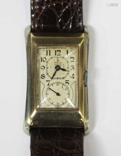 A Rolex Prince 9ct yellow and white gold rectangular curved cased gentleman's wristwatch, the signed
