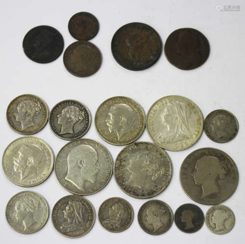 A group of British pre-1920 silver coins, comprising four half-crowns, 1846, 1878, 1898 and 1910,