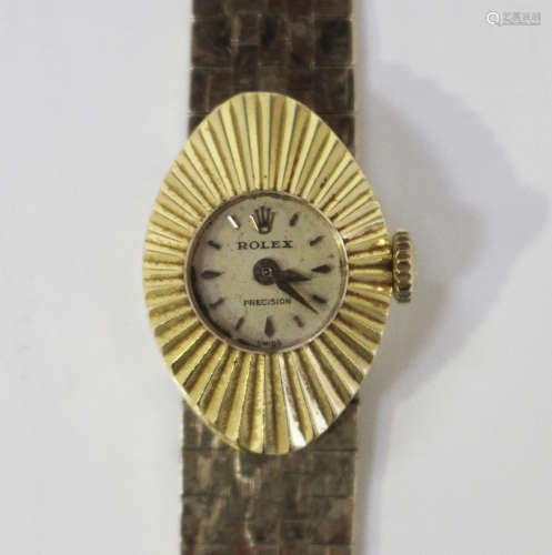 A Rolex Precision 18ct gold lady's wristwatch with signed jewelled movement, the signed dial with