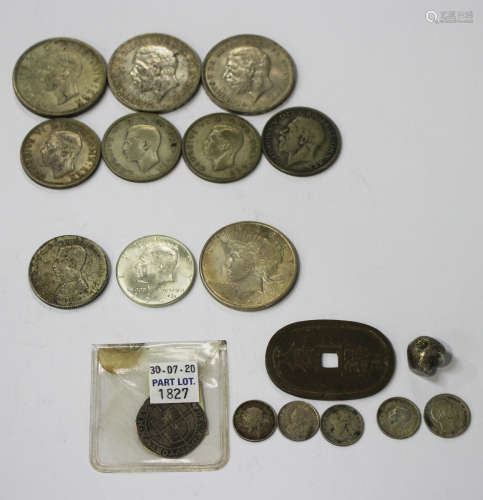 A collection of mixed world coinage, including an Elizabeth I sixpence 1580, a USA one dollar
