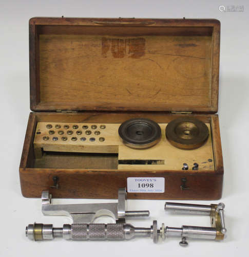 A Boley & Leinen watchmaker's lathe, within a mahogany case, the hinged lid with applied gilt