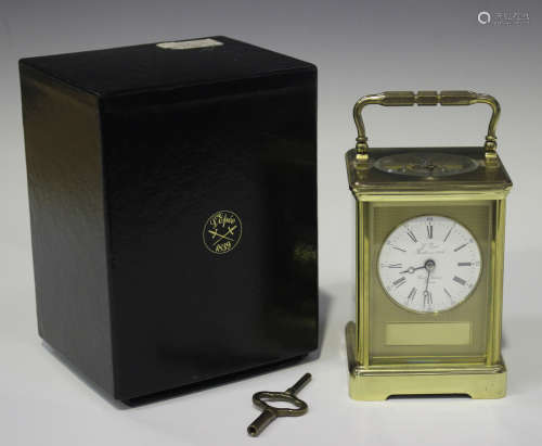 A 20th century French lacquered brass carriage clock by L'Epée, with eight day movement striking