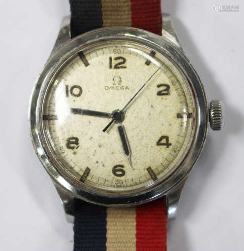 An Omega steel circular cased gentleman's wristwatch, circa 1943, the signed and jewelled movement