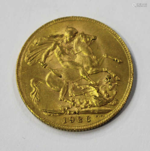 A George V sovereign 1926 SA.Buyer’s Premium 29.4% (including VAT @ 20%) of the hammer price. Lots