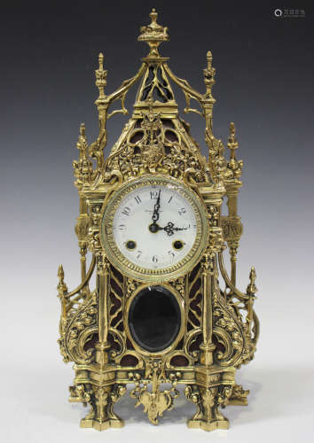 A late 20th century brass Gothic style mantel clock with Franz Hermle eight day movement striking on