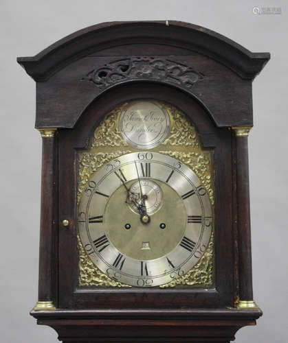 A George III Scottish oak longcase clock with eight day movement striking on a bell, the 12-inch