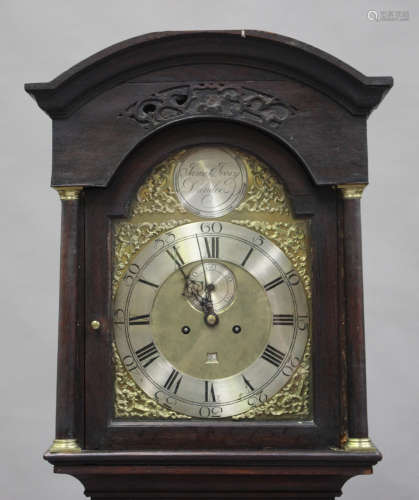 A George III Scottish oak longcase clock with eight day movement striking on a bell, the 12-inch