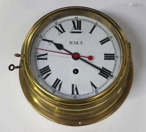 A mid-20th century brass circular cased ship's timepiece, the eight day movement with platform