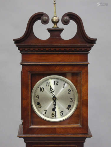 An Edwardian mahogany diminutive longcase clock with eight day chiming movement, the silvered