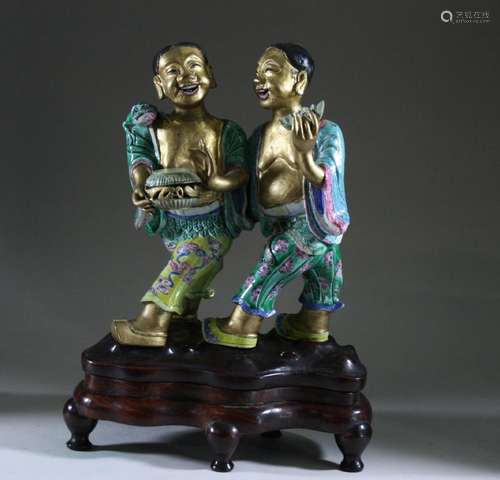 Chinese Porcelain Figural Group with Laughing Boys, 20th C.