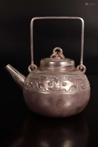 A Chinese Taotie Pattern Handled Pot