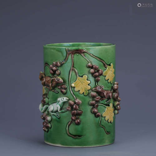 A Chinese Green Glazed Relief Porcelain Brush Pot