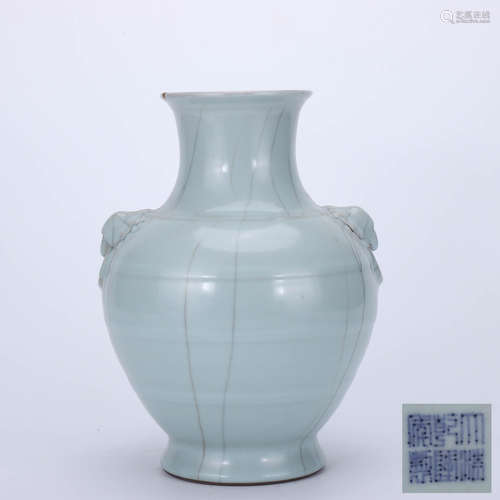 A Chinese Cyan Glazed Lion Ears Porcelain Zun