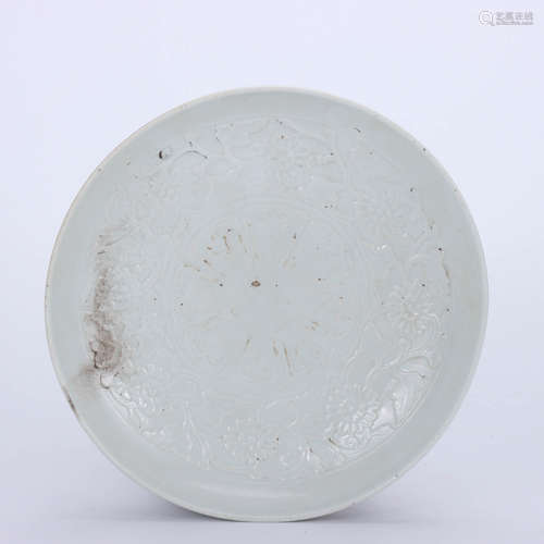 A Chinese White Glazed Relief Floral Porcelain Standing Cup