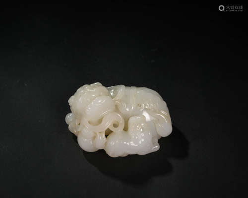 A Chinese White Jade Lion Ornament