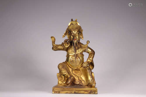A Chinese Bronze Gilding Sitting Statue