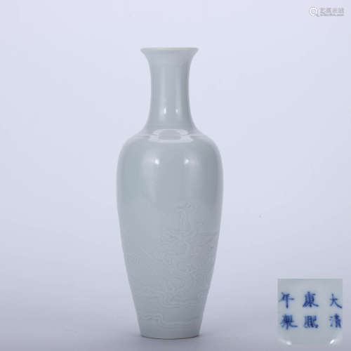 A Chinese White Glazed Relief Dragon Pattern Porcelain Vase