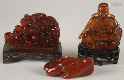 Three Chinese Amber Carvings, 19th/20th Century