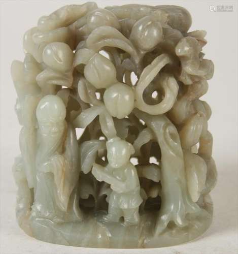 Carved Celadon and Russet Jade Figural Group with Shoulau, 19th cent.