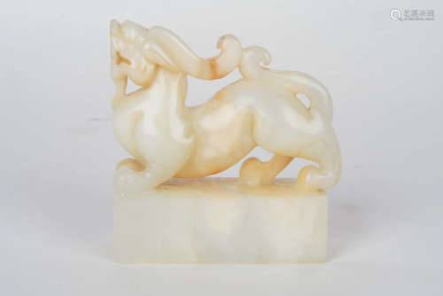 A Chinese Auspicious Beast Carved Hetian Jade Ornament